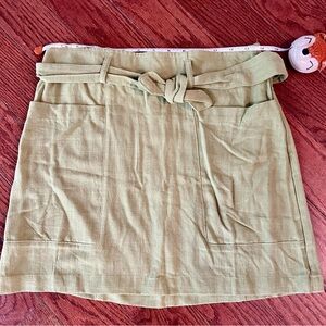 Francesca’s green skirt